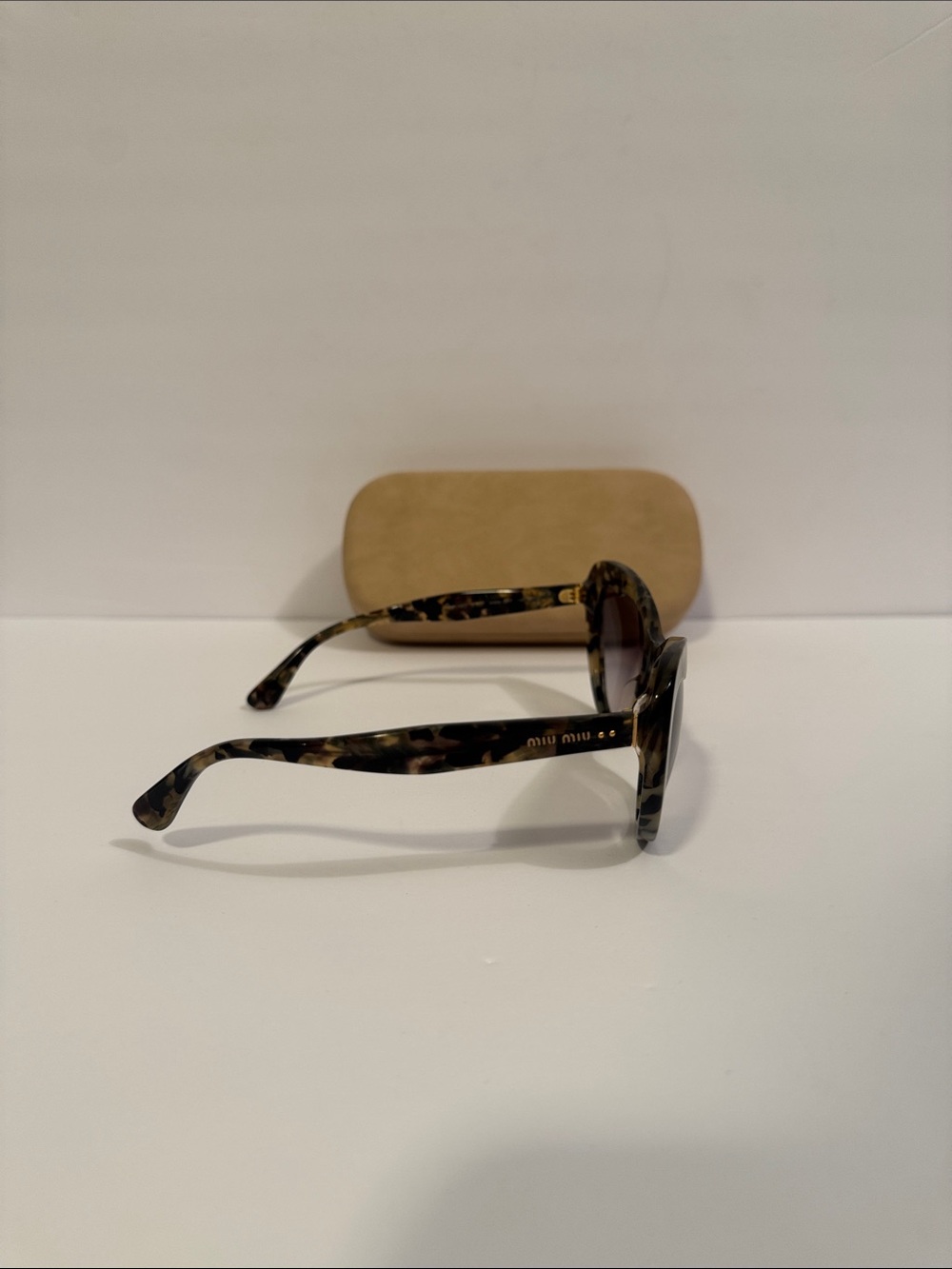 Miu Miu Tortoiseshell Cat-Eye Sunglasses— SMU040 - Picture 3 of 5